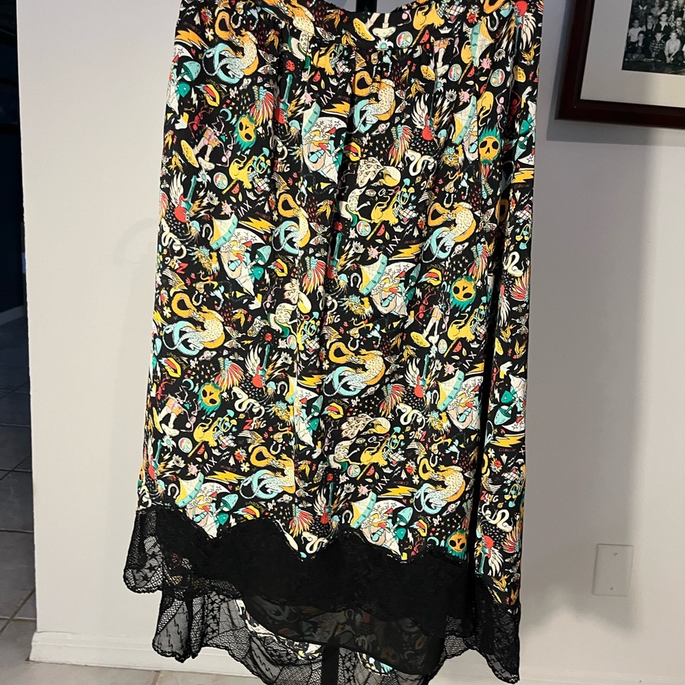 Floral Black Skirt
Medium skirt
Waist A Line 
Elastic waistband